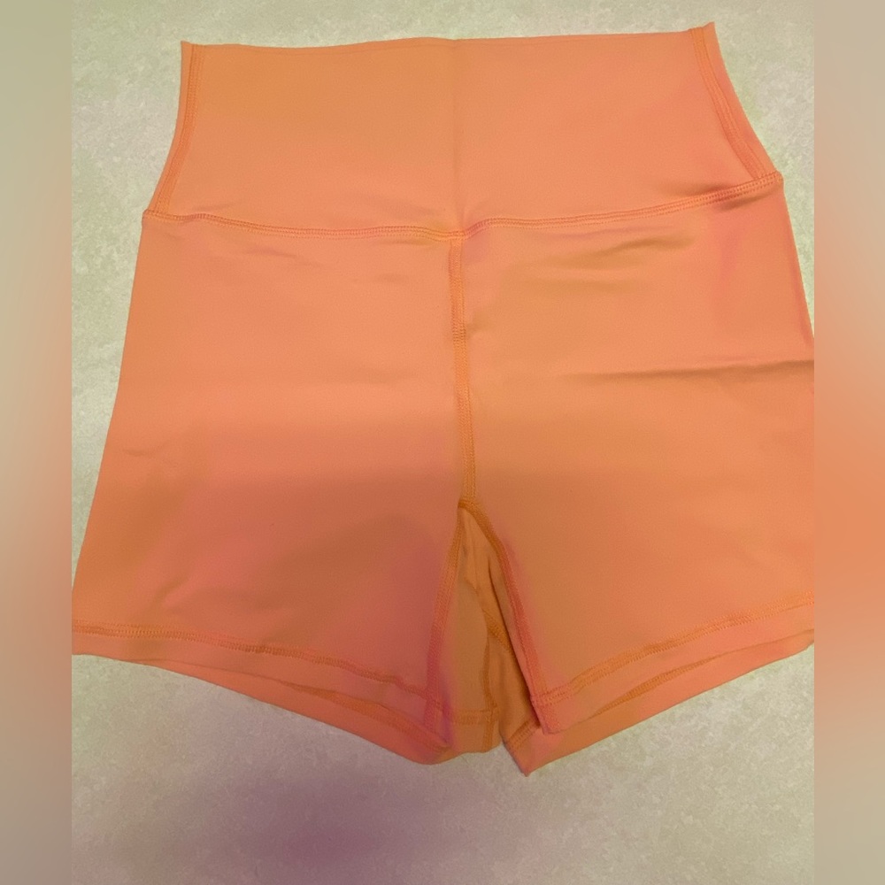 Til you collapse peach booty shorts
